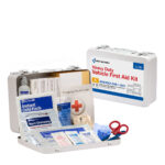 Opened sterile first aid kit with medical supplies.