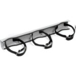 Wall-mounted holder with three adjustable straps.