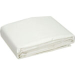 Folded white bed sheet on display.