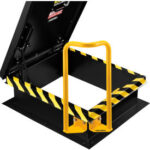 Roof hatch with yellow safety railing.