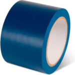 Blue roll of adhesive tape, white core.