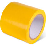 Yellow adhesive tape roll on white background.