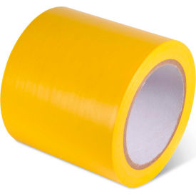 Yellow adhesive tape roll on white background.