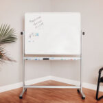 Global Industrial™ Mobile Reversible Whiteboard - 48""W x 36""H - Porcelain - Silver Frame
