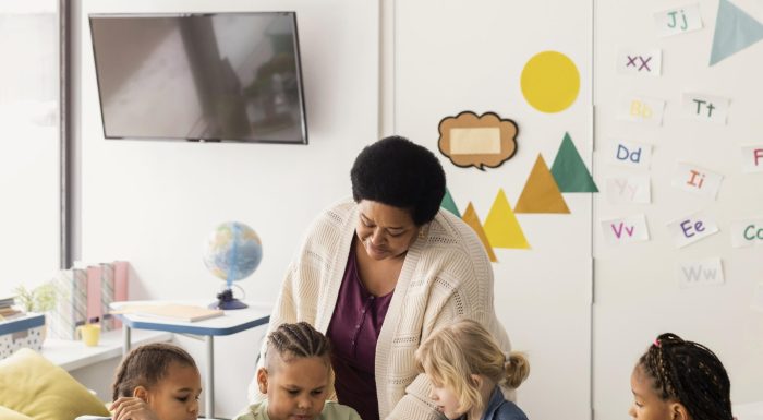 children-drawing-together-classroom children-drawing-together-classroom