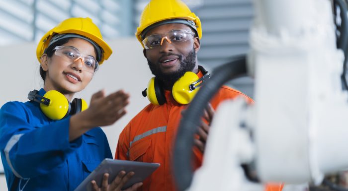 engineer-cooperation-male-female-technician-maintenance-control-relay-robot-arm-system-welding-with-tablet-laptop-control-quality-operate-process-work-heavy-industry-40-manufacturing-factory (4) engineer cooperation male and female technician maintenance control relay robot arm system welding with tablet laptop to control quality operate process work heavy industry 4.0 manufacturing factory